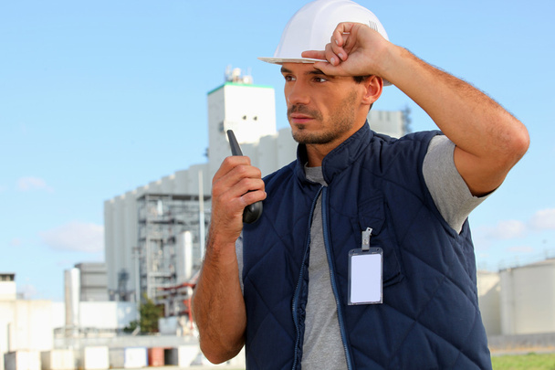 Foreman with radio receiver - 写真・画像