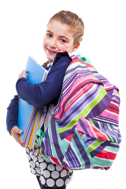 student girl holding notebooks and backpack  - Фото, изображение