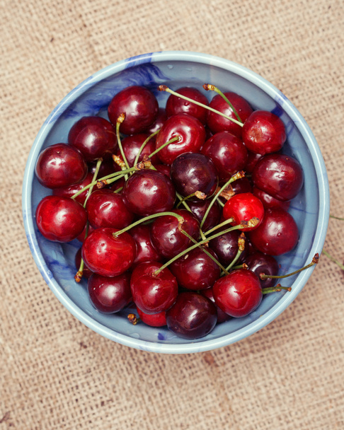 Fresh cherries berries in blue bowl - Photo, Image