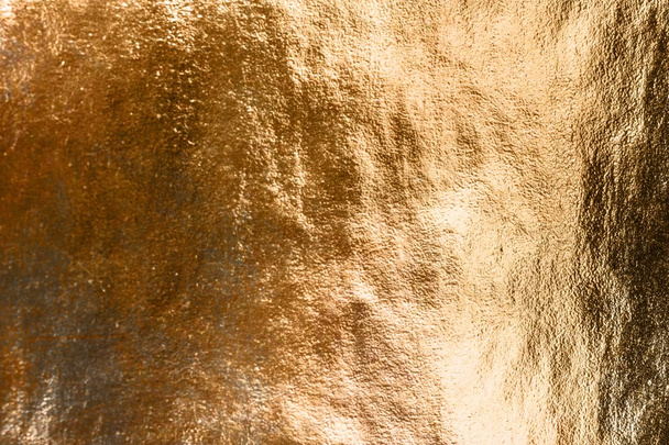 Uneven golden surface - Фото, изображение