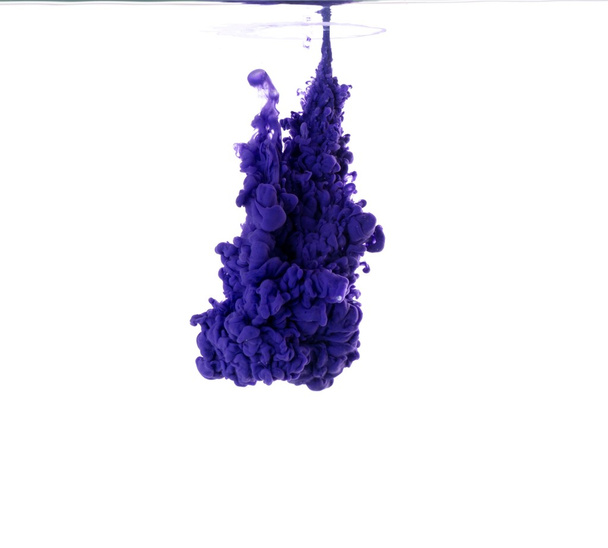 Purple  acrylic color in water - Фото, изображение