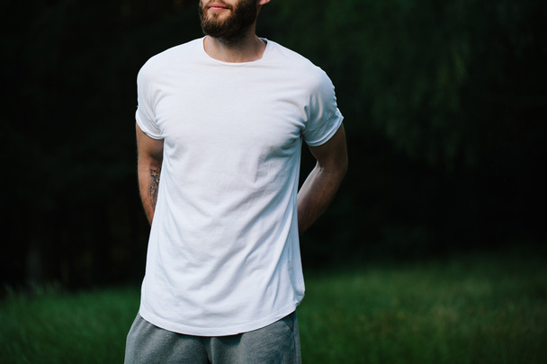 Hipster man wearing white blank t-shirt with space for your logo - Foto, immagini