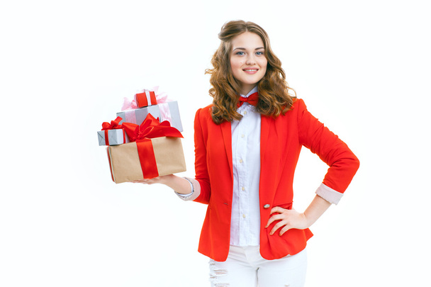Joyful woman holding a box with gift - Fotó, kép