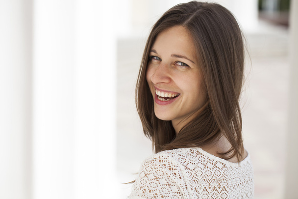 Closeup portrait of a happy young woman smiling - Foto, immagini
