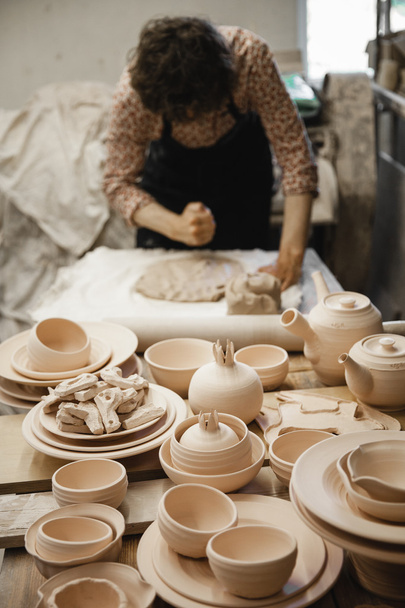 Potter master mashing the clay - Φωτογραφία, εικόνα
