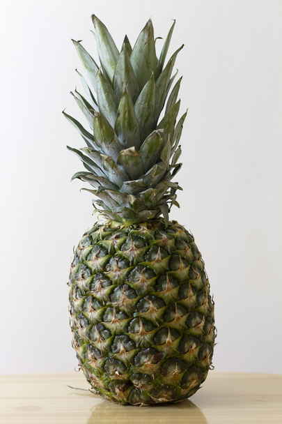Pineapple on neutral background - Valokuva, kuva