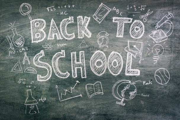 Freehand drawing Back to school on chalkboard - Foto, Bild