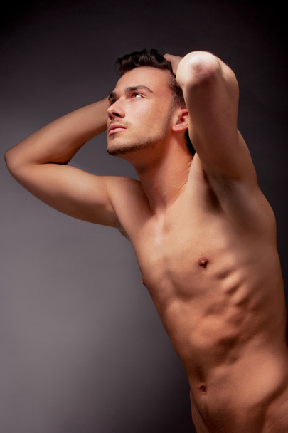 Young handsome muscular man - Foto, afbeelding