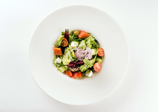 greek salad on plate - Fotoğraf, Görsel
