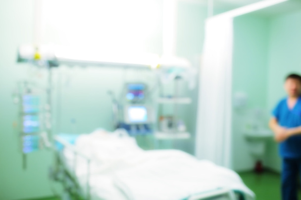 Doctor in hospital ward, defocused background - Foto, Bild