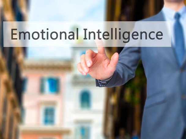 Inteligência emocional - Empresário mão pressionando botão no tou
 - Foto, Imagem