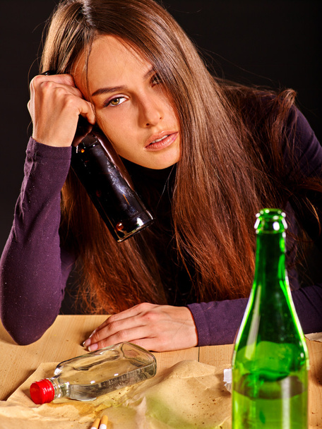 Girl in depression drinking alcohol. - Photo, Image