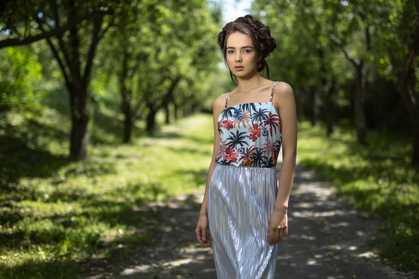 girl in a dress stands on the nature background - Foto, immagini
