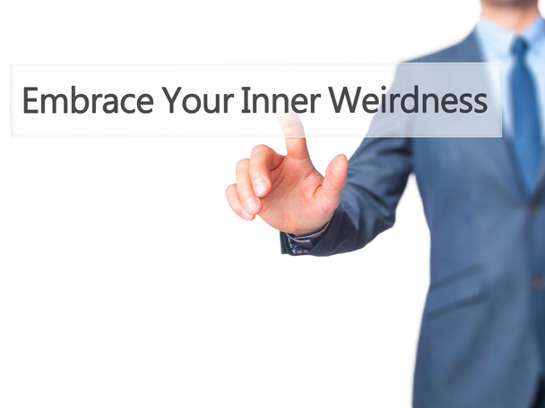 Αγκαλιάσει παραξενιά σας Inner - επιχειρηματίας χέρι πιέζοντας κουμπί  - Φωτογραφία, εικόνα