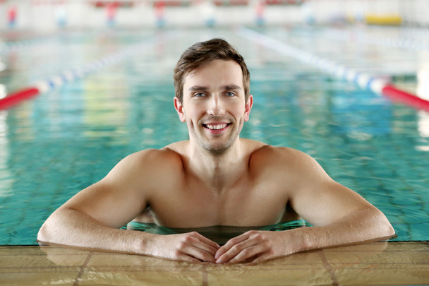 sporty man in the swimming pool - Фото, изображение