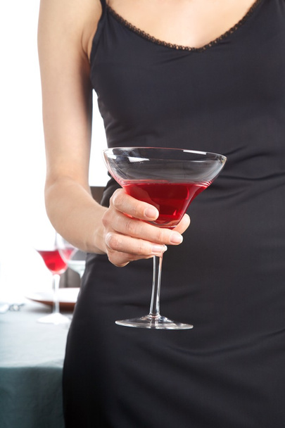 Woman hand with red cocktail - Fotoğraf, Görsel