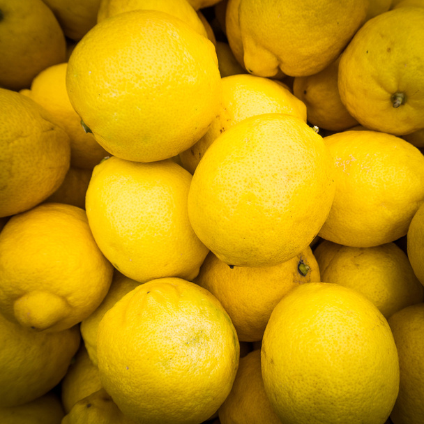 lemons background.   Group of fresh lemons  - 写真・画像