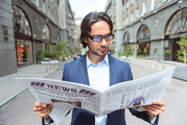 Confident businessman wants to know news - Foto, Imagen