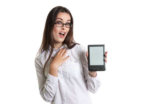 Joyful Beautiful young long-haired woman in glasses with an e-book. Human emotions, surprise, mouth open - Foto, Imagem