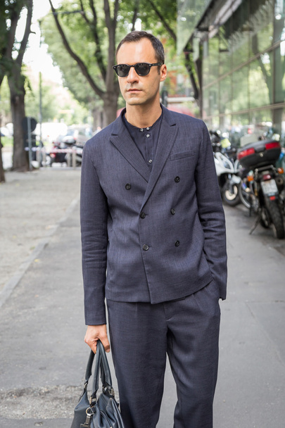 Fashionable man posing during Milan Men's Fashion Week - Foto, afbeelding