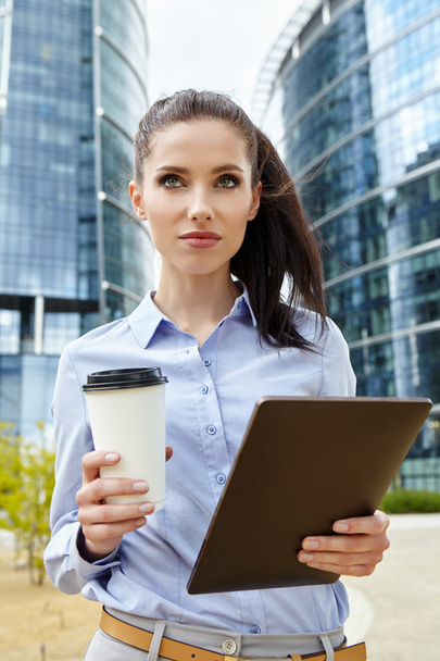 businesswoman with disposable coffee cup - Photo, Image