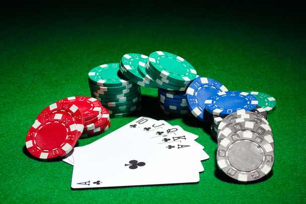 Cards and chips for poker on green table - Foto, Imagem