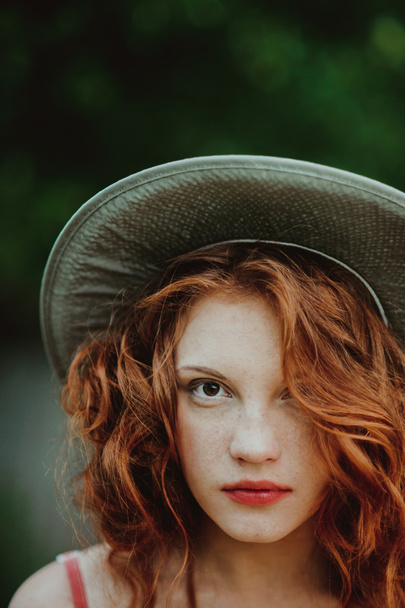 Portrait of a young redhead woman - Фото, зображення