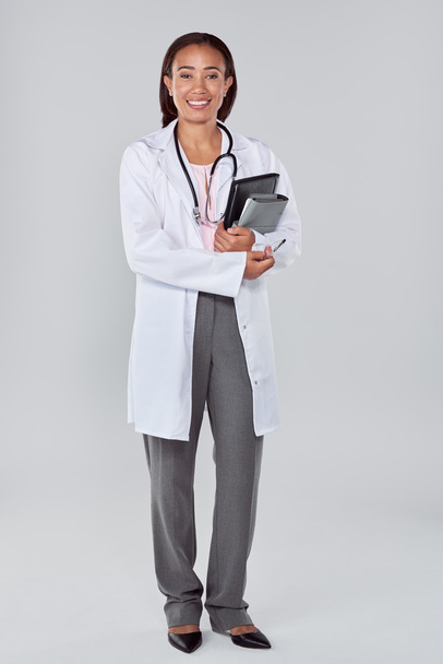 female doctor in lab coat and sethoscope - Фото, изображение