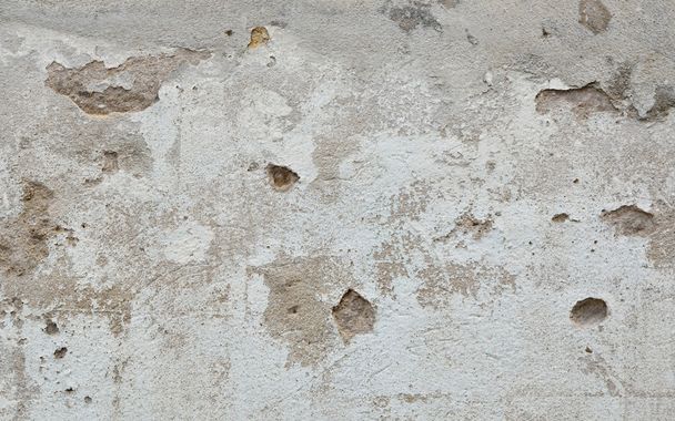 Old wall with cracks and peeling paint, texture background - Photo, image