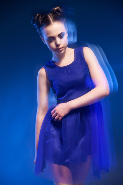 Woman in blue dress with hairstyle and make-up - Foto, Bild