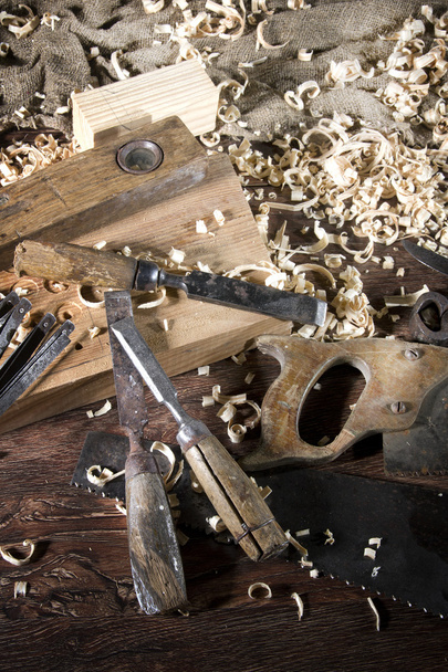 Workplace carpenter. Wood and a few tools - Фото, зображення