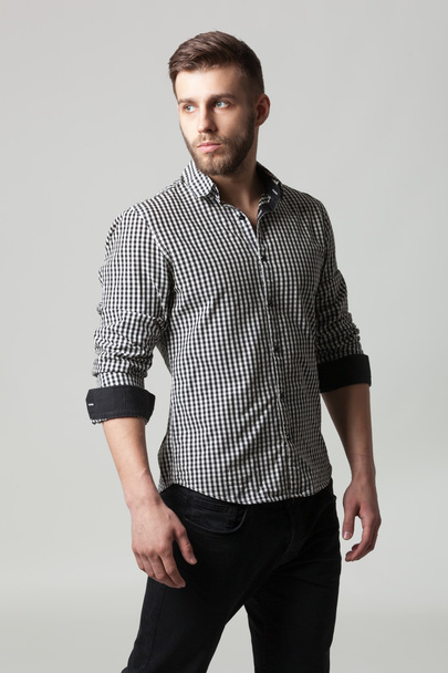 Studio portrait of handsome elegant young man in casual clothes  - Photo, image