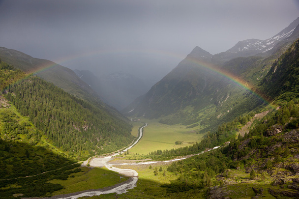 Regenbogen in den Alpen - Foto, Bild