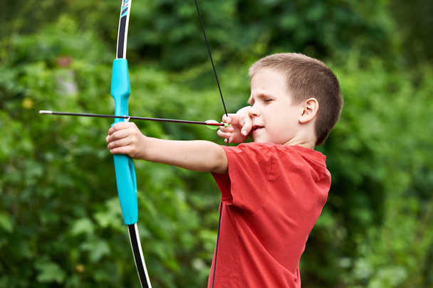 Little archer with bow and arrow - Zdjęcie, obraz