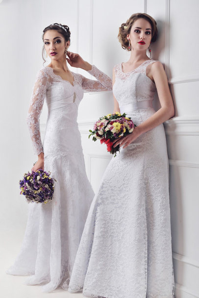 Two beautiful bride posing together - Fotografie, Obrázek