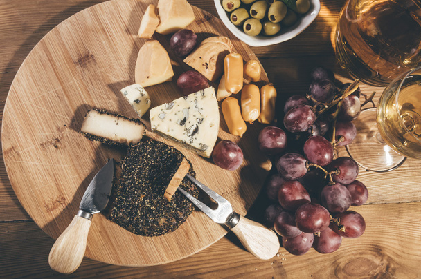 Various cheeses on the board - Photo, Image