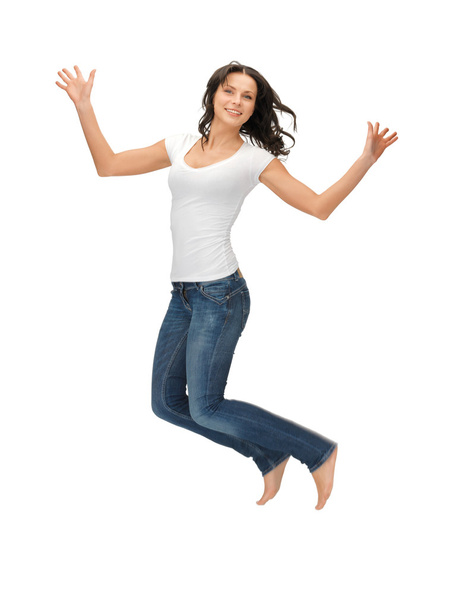 Jumping woman in blank white t-shirt - Fotoğraf, Görsel