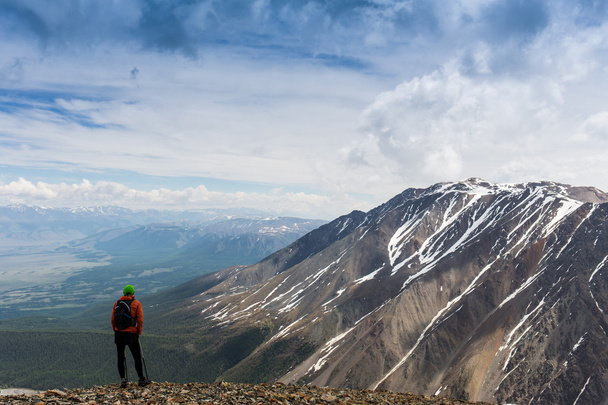 Man hiker on top of a mountain - Photo, Image