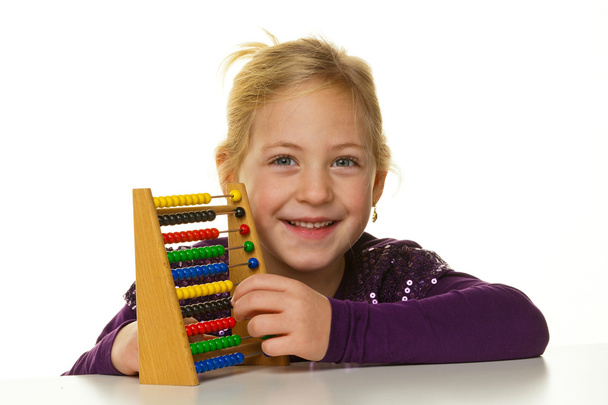 School child is expecting an abacus - Фото, изображение