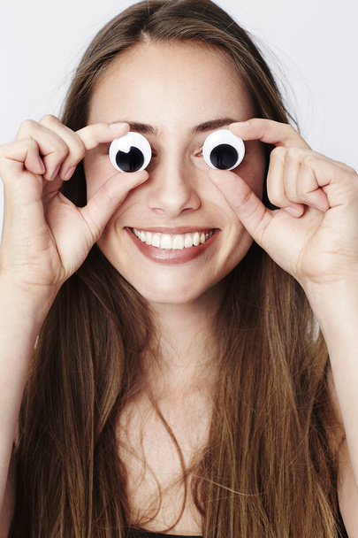 Googly eyed girl smiling - Фото, изображение