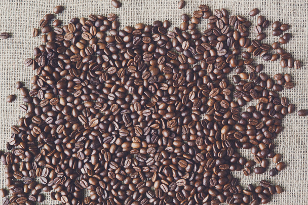 Texture di iuta con bordo chicchi di caffè
 - Foto, immagini