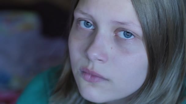 Depressed teen girl crying alone. 4K UHD. - Felvétel, videó