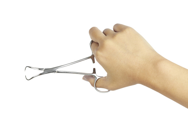 Hand with metal medical equipment tools for teeth dental care - Foto, imagen
