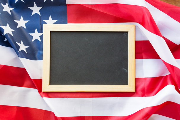 School blackboard on american flag - Foto, imagen