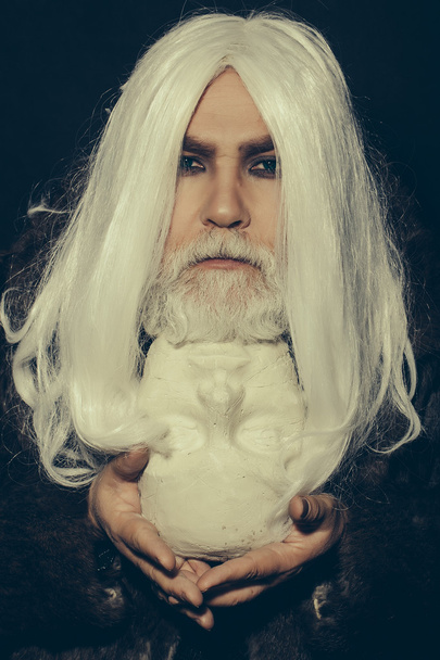 bearded man with sculpture head - Zdjęcie, obraz