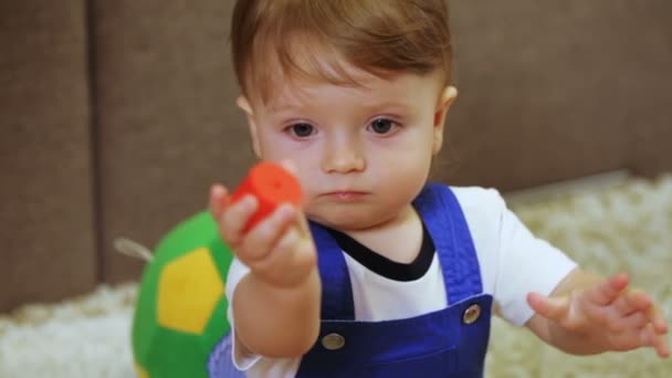 Children conundrum in child hands - Filmati, video