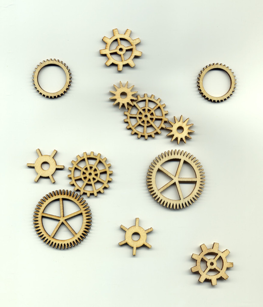 Varieties of different forms of gears on a light background                                            - Photo, Image