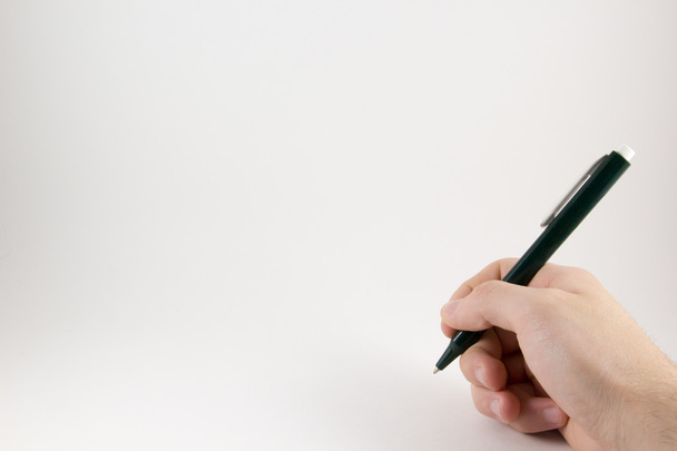 μολύβι στο χέρι, σε λευκό φόντο - Φωτογραφία, εικόνα