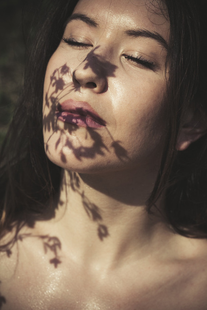 summer shadows on woman face - Photo, Image