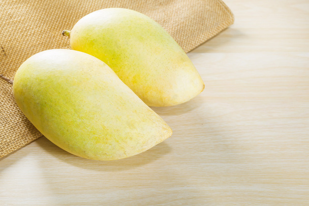 two yellow mangoes - Photo, Image